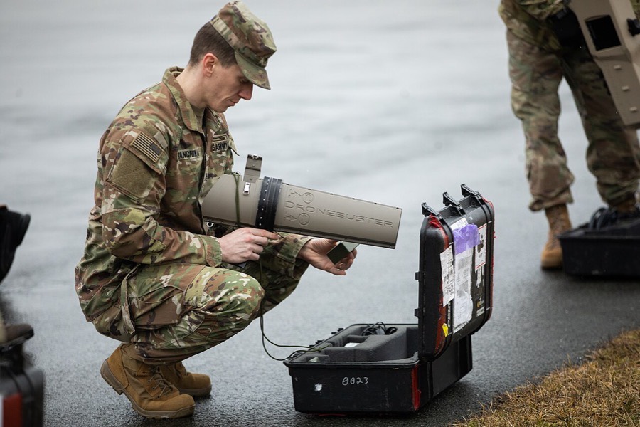 Soldier holds a Dronebuster Block 3B handheld jammer at Grafenwoehr, Germany.