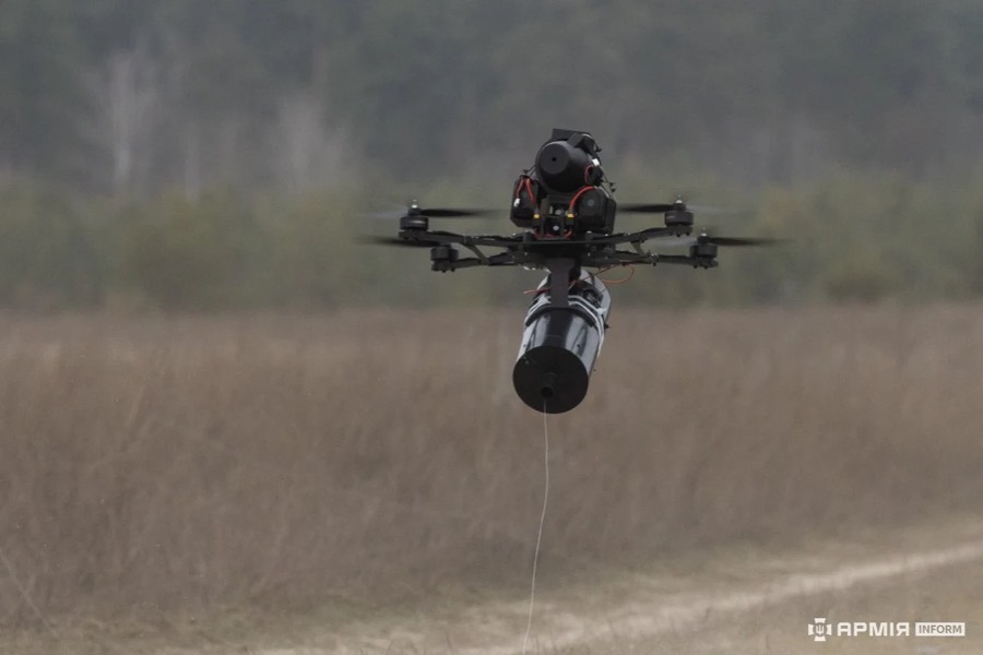 Ukrainian FPV drone with a fiber-optic spool, shown as a class example, not a Russian KVN.