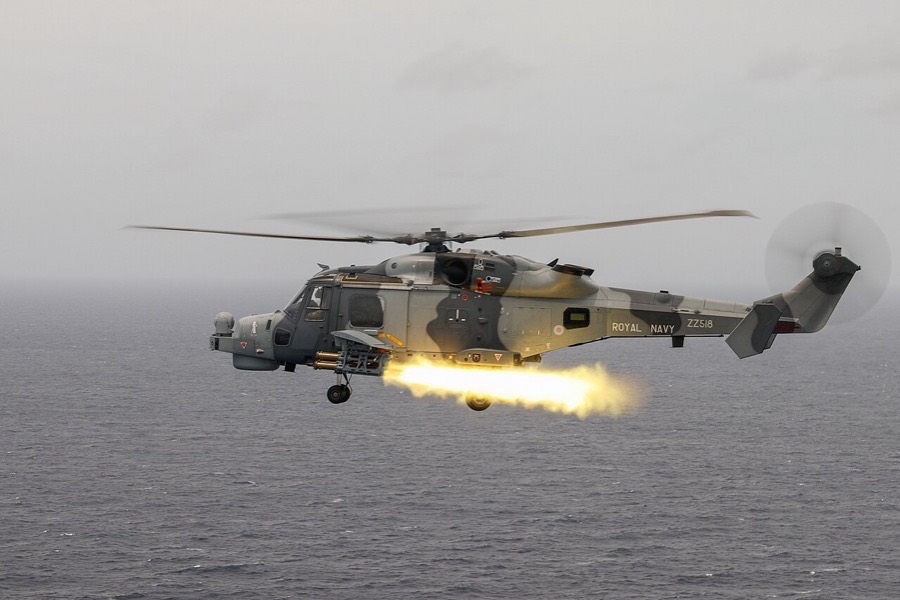 A Royal Navy Wildcat helicopter fires the first operational Martlet missile.