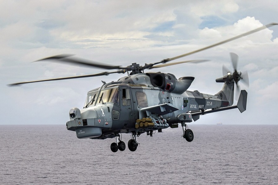 Royal Navy Wildcat HMA2 carrying Martlet missiles on its weapon wings.