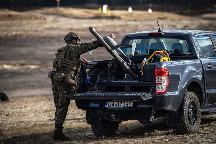 Polish soldier prepares a Merops interceptor for launch at Nowa Deba, November 2025.