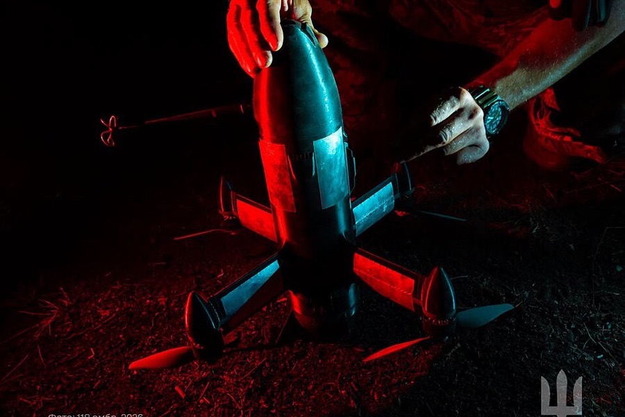 A soldier of the 118th Mechanized Brigade works on a Sting interceptor drone.